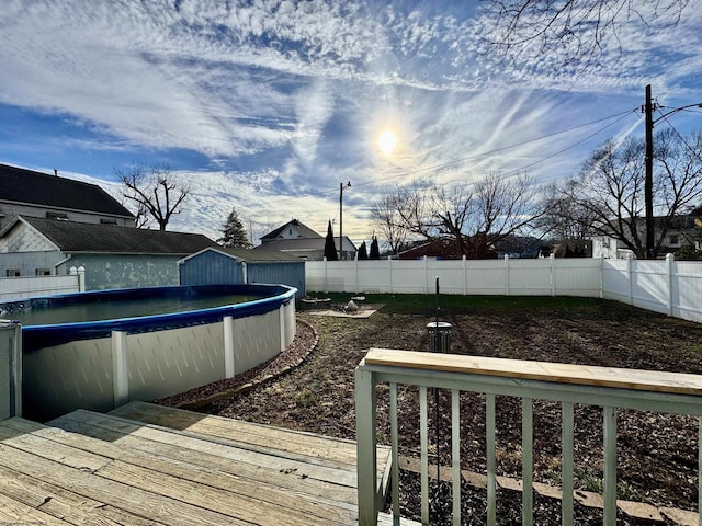 deck with a covered pool