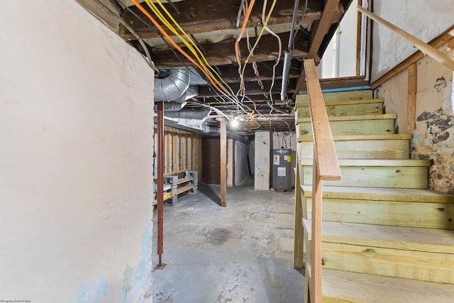 basement featuring electric water heater