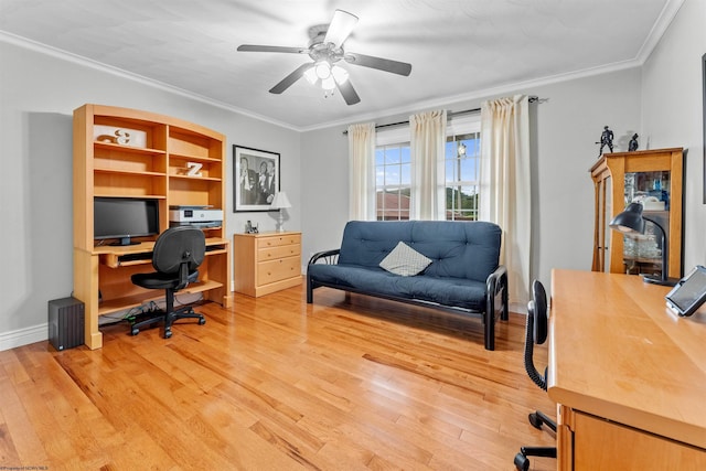 office with light hardwood / wood-style flooring, ceiling fan, and ornamental molding