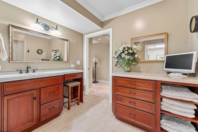 bathroom with crown molding and vanity