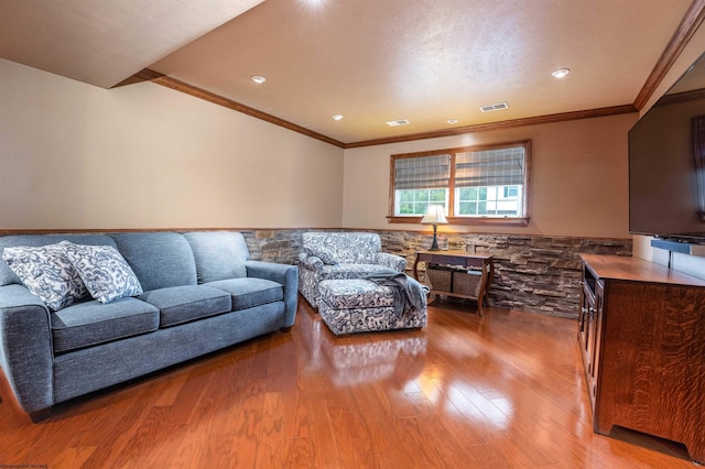 living room featuring hardwood / wood-style floors and ornamental molding