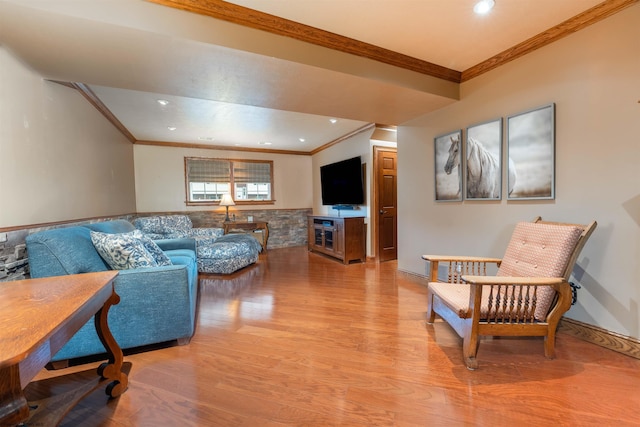 living room featuring light hardwood / wood-style flooring and crown molding