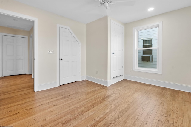 additional living space featuring light hardwood / wood-style floors and ceiling fan