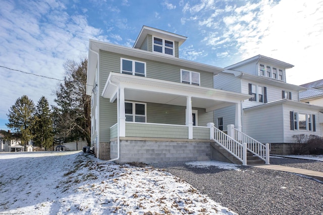 view of front of property featuring covered porch