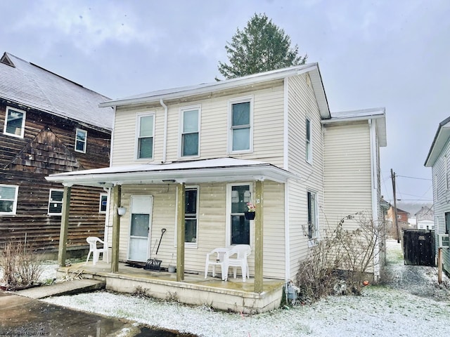 view of front of property featuring covered porch