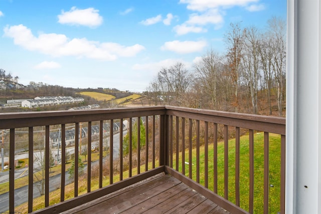 deck featuring a lawn