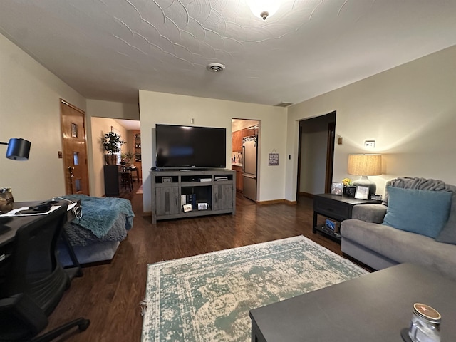 living room featuring dark hardwood / wood-style flooring