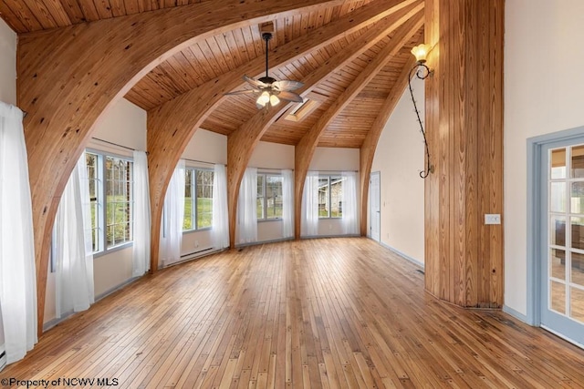 unfurnished living room with ceiling fan, wooden ceiling, beamed ceiling, high vaulted ceiling, and light wood-type flooring