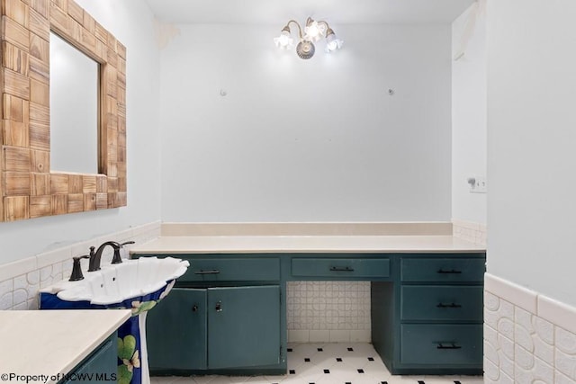 bathroom with tile walls and sink