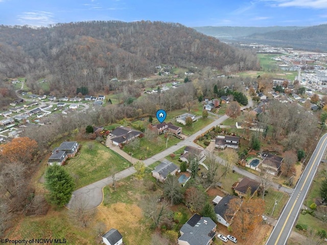 drone / aerial view featuring a mountain view