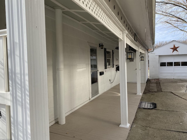 exterior space with an outbuilding and a garage