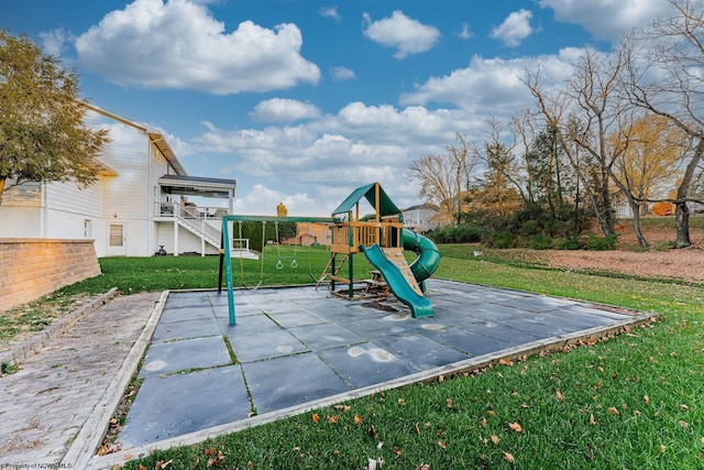 view of playground with a yard