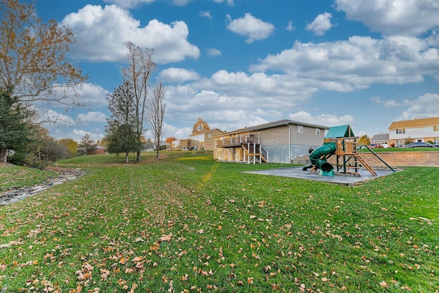 view of yard featuring a playground