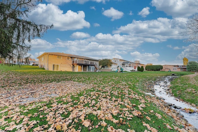 view of yard with a deck