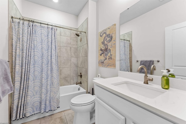 full bathroom featuring tile patterned flooring, vanity, toilet, and shower / tub combo