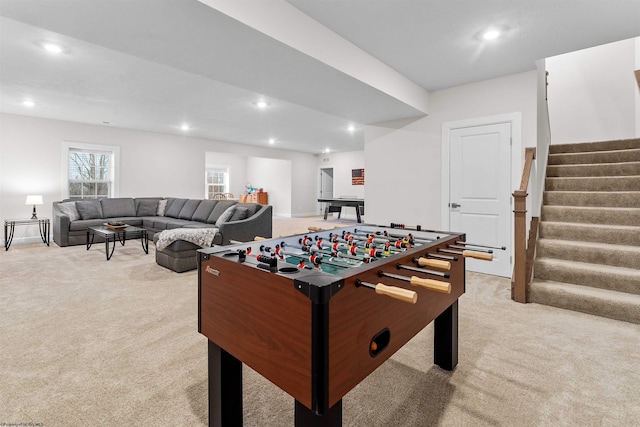 game room with light carpet