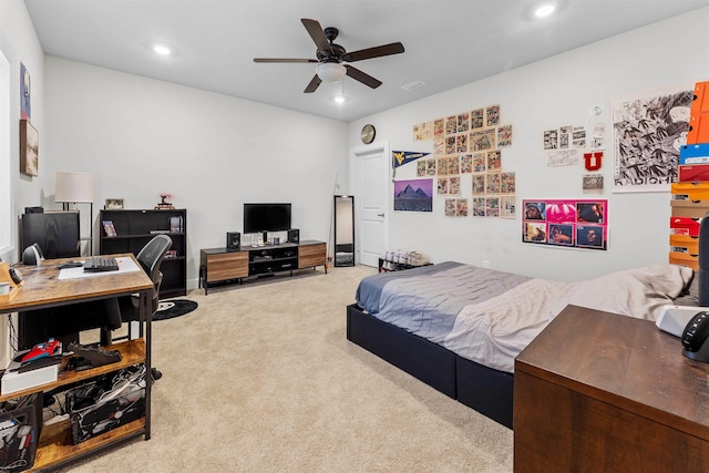 carpeted bedroom with ceiling fan