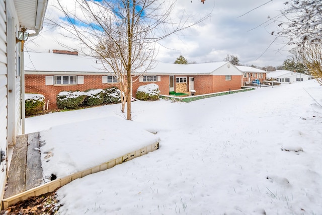 view of snowy yard