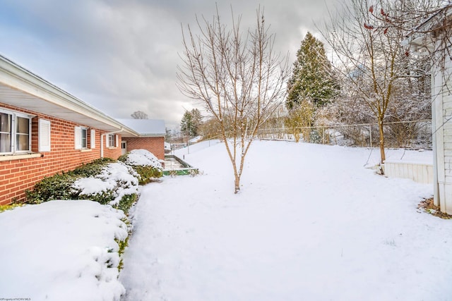 view of snowy yard