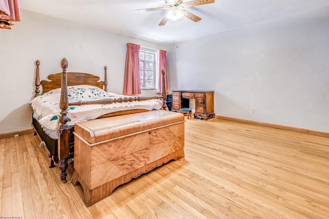 bedroom featuring light wood-type flooring and ceiling fan