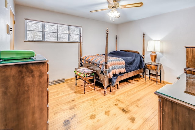 bedroom featuring light hardwood / wood-style flooring and ceiling fan