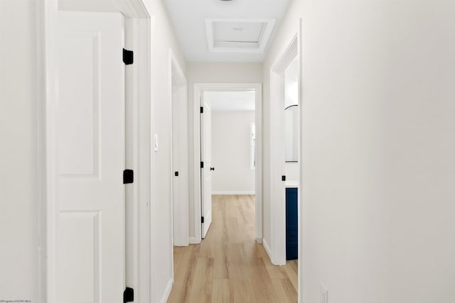 hallway featuring light hardwood / wood-style floors