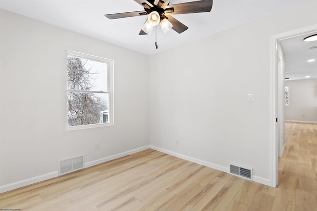 unfurnished room with ceiling fan and light hardwood / wood-style flooring