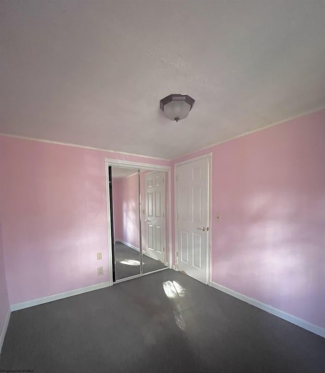 unfurnished bedroom featuring a closet