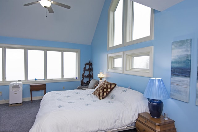 bedroom with carpet floors, high vaulted ceiling, and ceiling fan