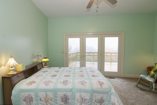 carpeted bedroom featuring french doors, access to outside, and ceiling fan