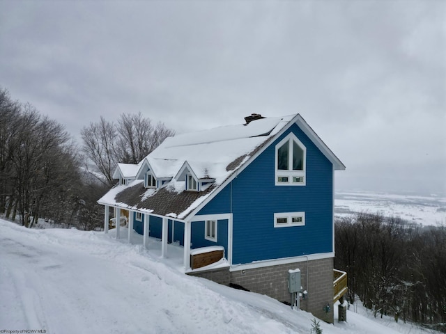 view of snow covered property