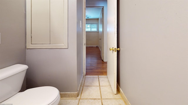 bathroom with tile patterned floors and toilet