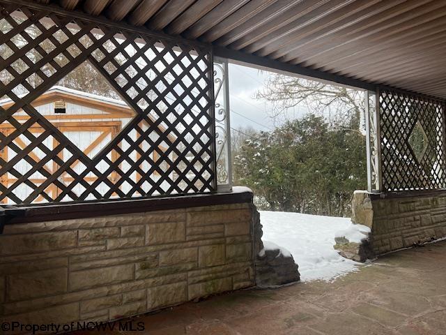 view of snow covered patio