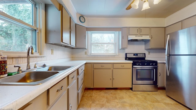 kitchen with ceiling fan, sink, and appliances with stainless steel finishes