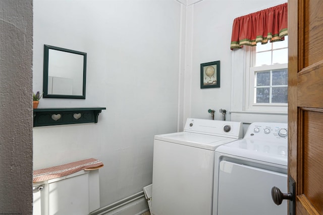 laundry room with independent washer and dryer