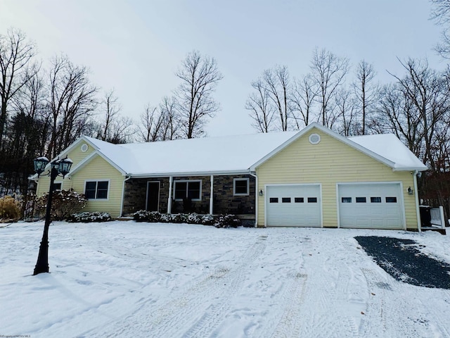 single story home featuring a garage