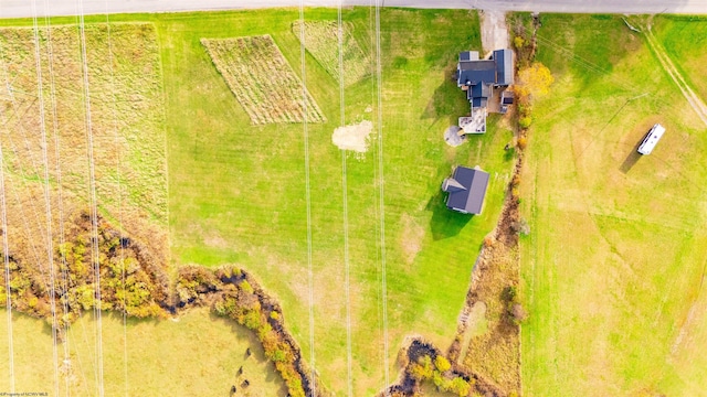 birds eye view of property featuring a rural view