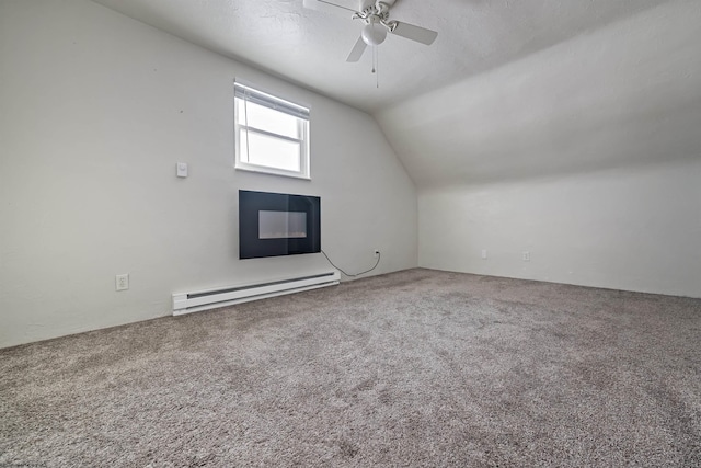 bonus room with lofted ceiling, carpet flooring, ceiling fan, a textured ceiling, and a baseboard radiator