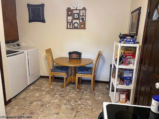 dining space featuring washing machine and dryer