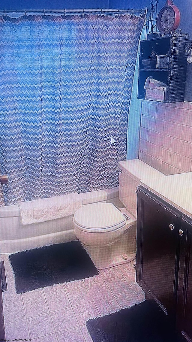 bathroom featuring toilet