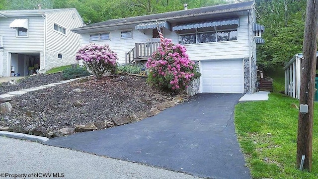 view of front of property with a garage