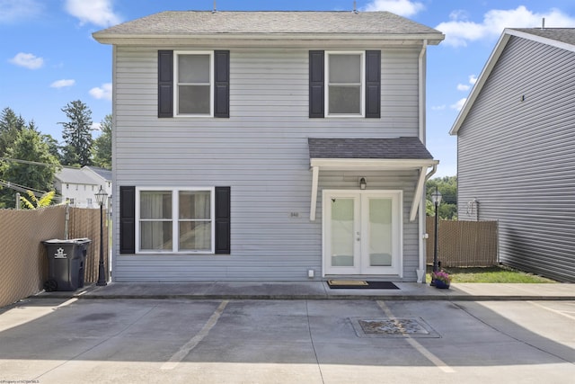 front facade featuring french doors