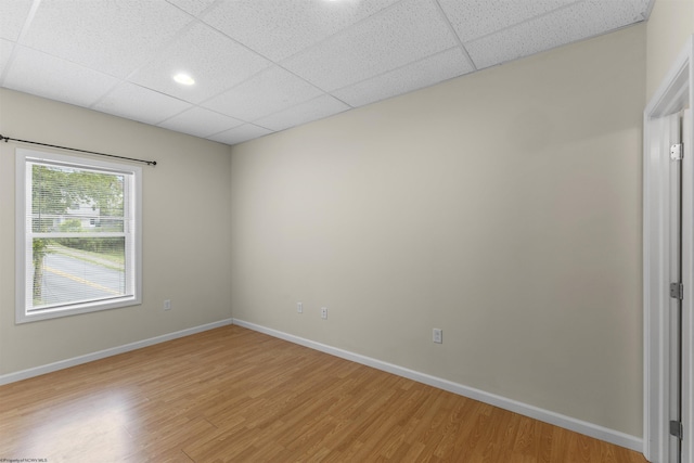 empty room with light hardwood / wood-style floors