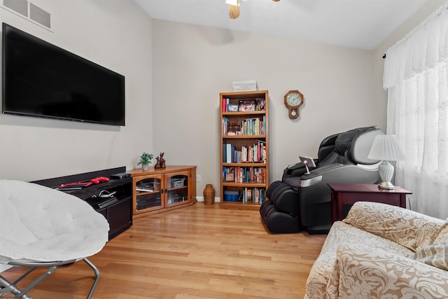 interior space featuring hardwood / wood-style flooring and ceiling fan