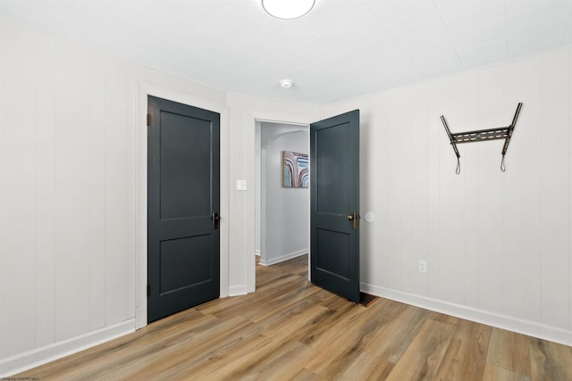 spare room featuring hardwood / wood-style floors