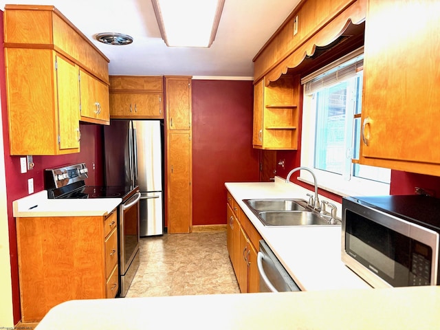 kitchen featuring stainless steel appliances and sink