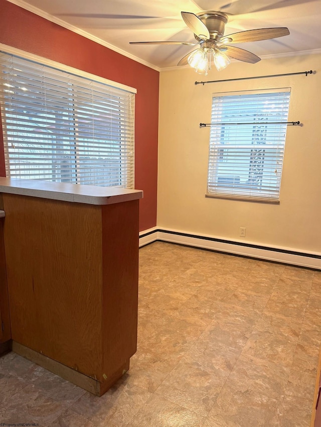 unfurnished room with a wealth of natural light, crown molding, ceiling fan, and a baseboard radiator