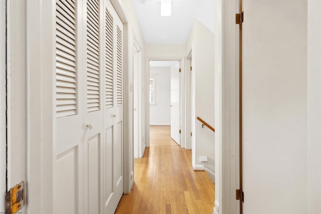 hallway featuring light wood-type flooring