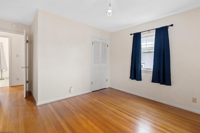 empty room featuring hardwood / wood-style floors