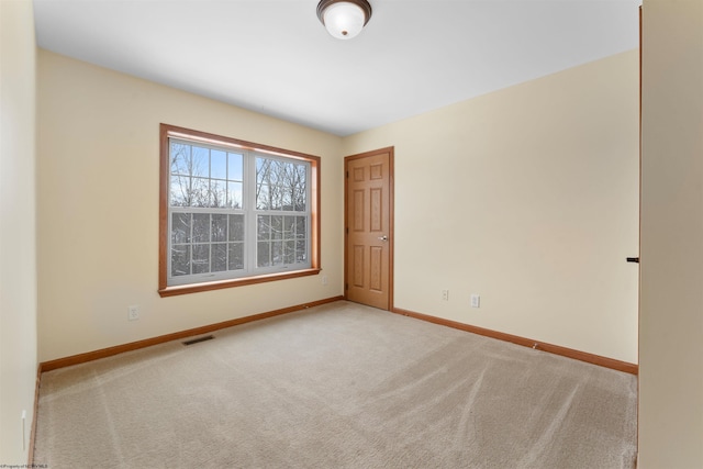 view of carpeted spare room